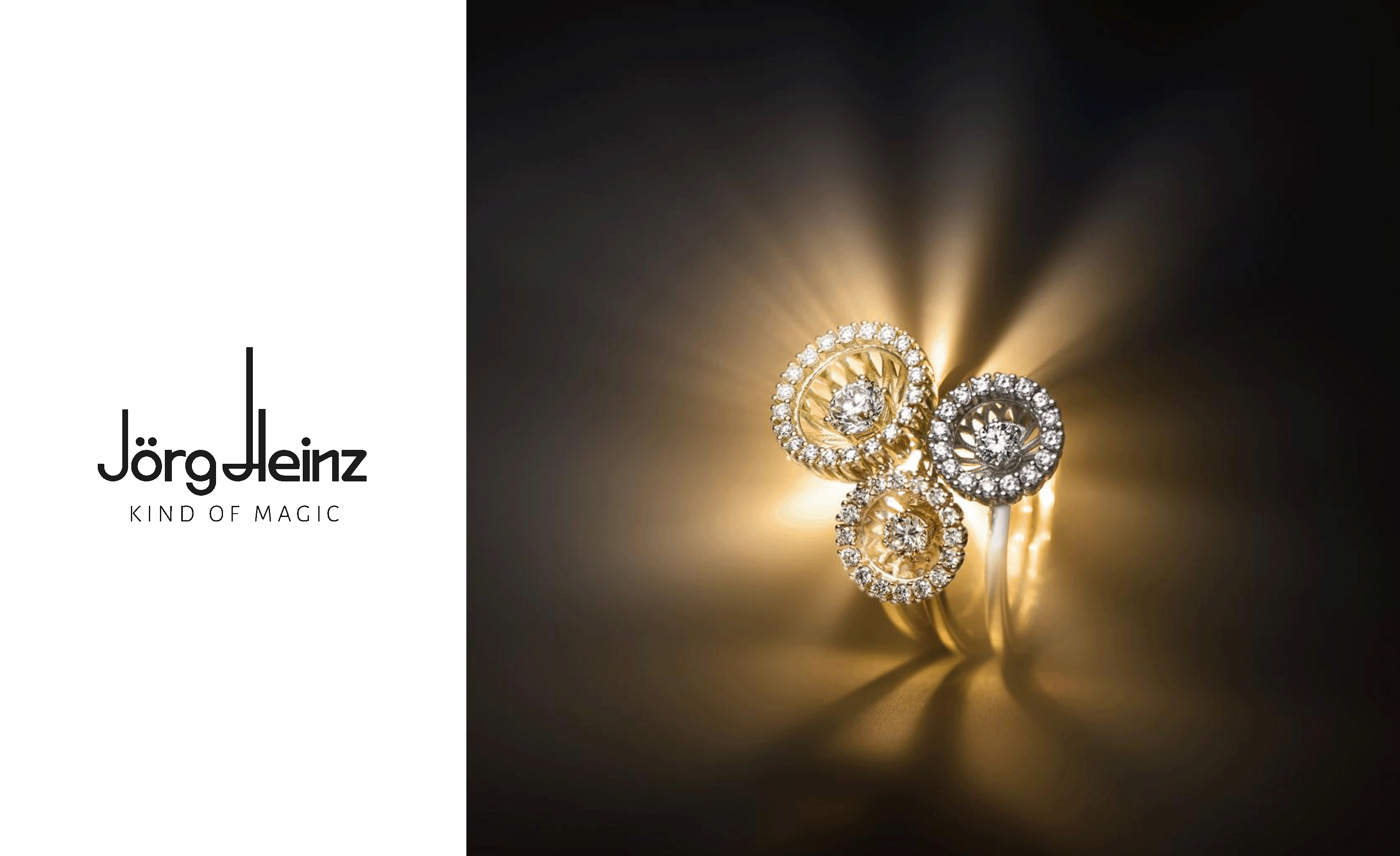 Drei goldene Swing Ringe der Schmuckmanufaktur J&ouml;rg Heinz werden von einem Licht von hinten angestahlt und l&auml;sst dabei die Schmuckst&uuml;ck, die mit vielen Diamanten besetzt sind, erstrahlen.